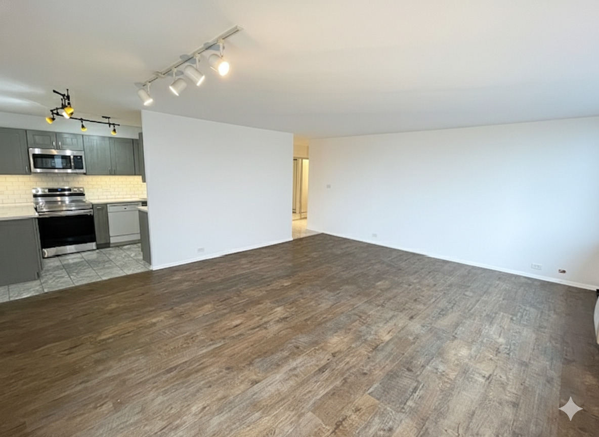 Undisclosed Address Chicago, IL 60613 - Photo 7 of 13 a view of a kitchen with a sink and a microwave