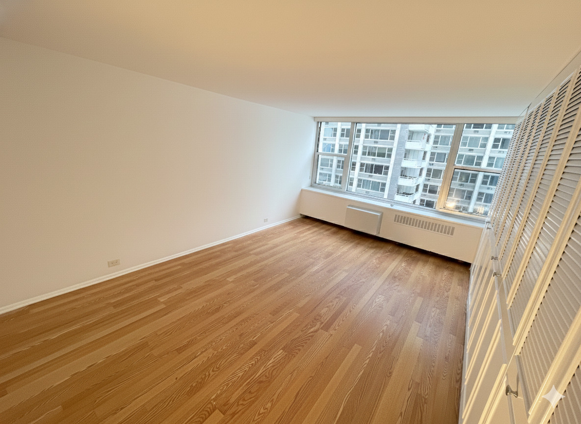 Undisclosed Address Chicago, IL 60613 - Photo 10 of 13 an empty room with wooden floor and windows