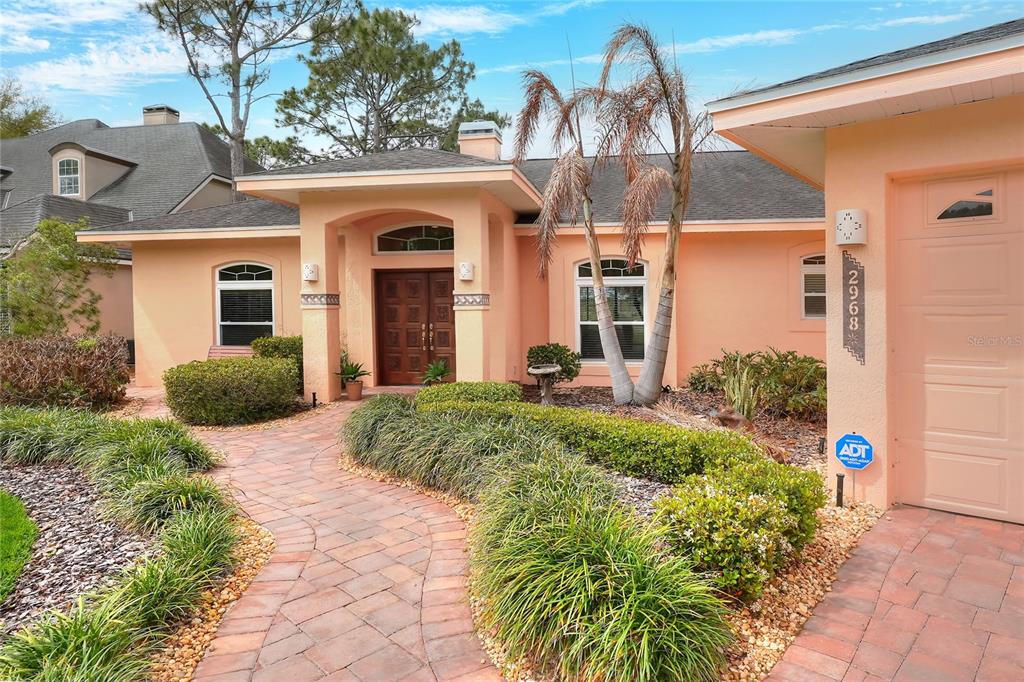 2968 Plantation Road Winter Haven, FL 33884 - Photo 7 of 81 a front view of a house with garden