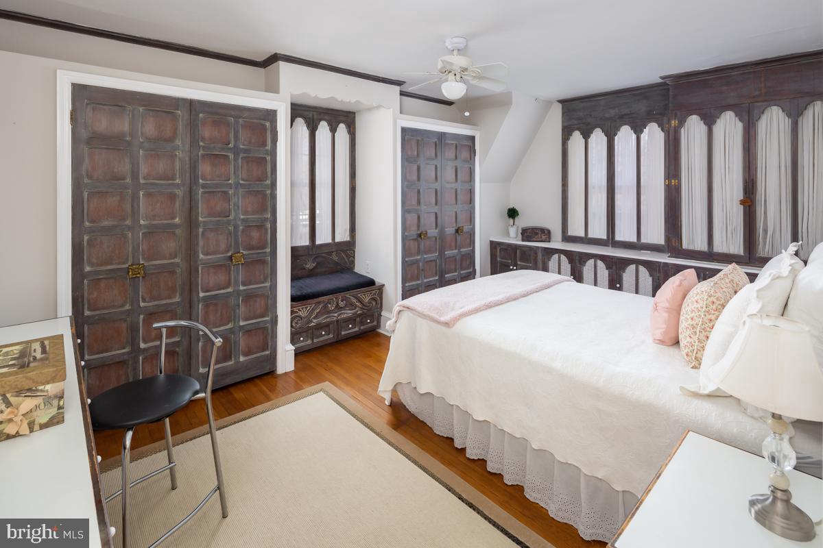 120 Crosshill Road Wynnewood, PA 19096 - Photo 13 of 29 a spacious bedroom with a bed and a walk in closet