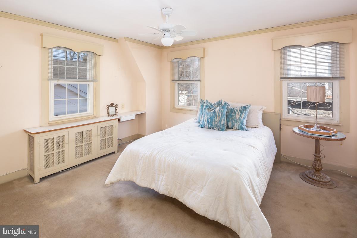 120 Crosshill Road Wynnewood, PA 19096 - Photo 16 of 29 a bedroom with a bed and a window