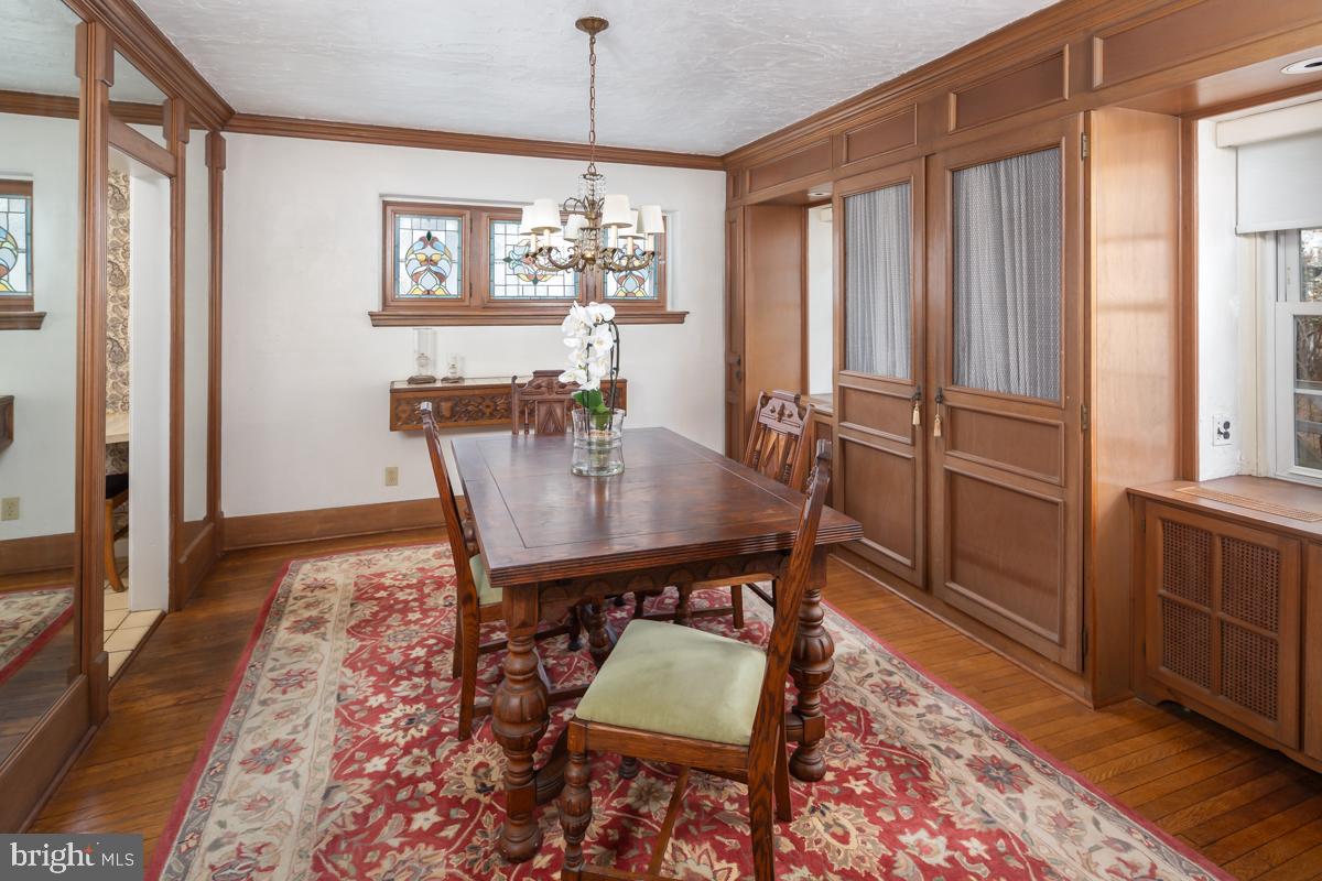 120 Crosshill Road Wynnewood, PA 19096 - Photo 8 of 29 a view of a dining room with furniture window and wooden floor