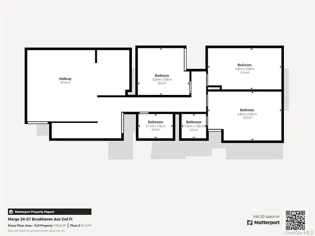 a kitchen with a refrigerator and a stove top oven