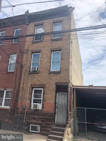 a front view of a building with glass windows
