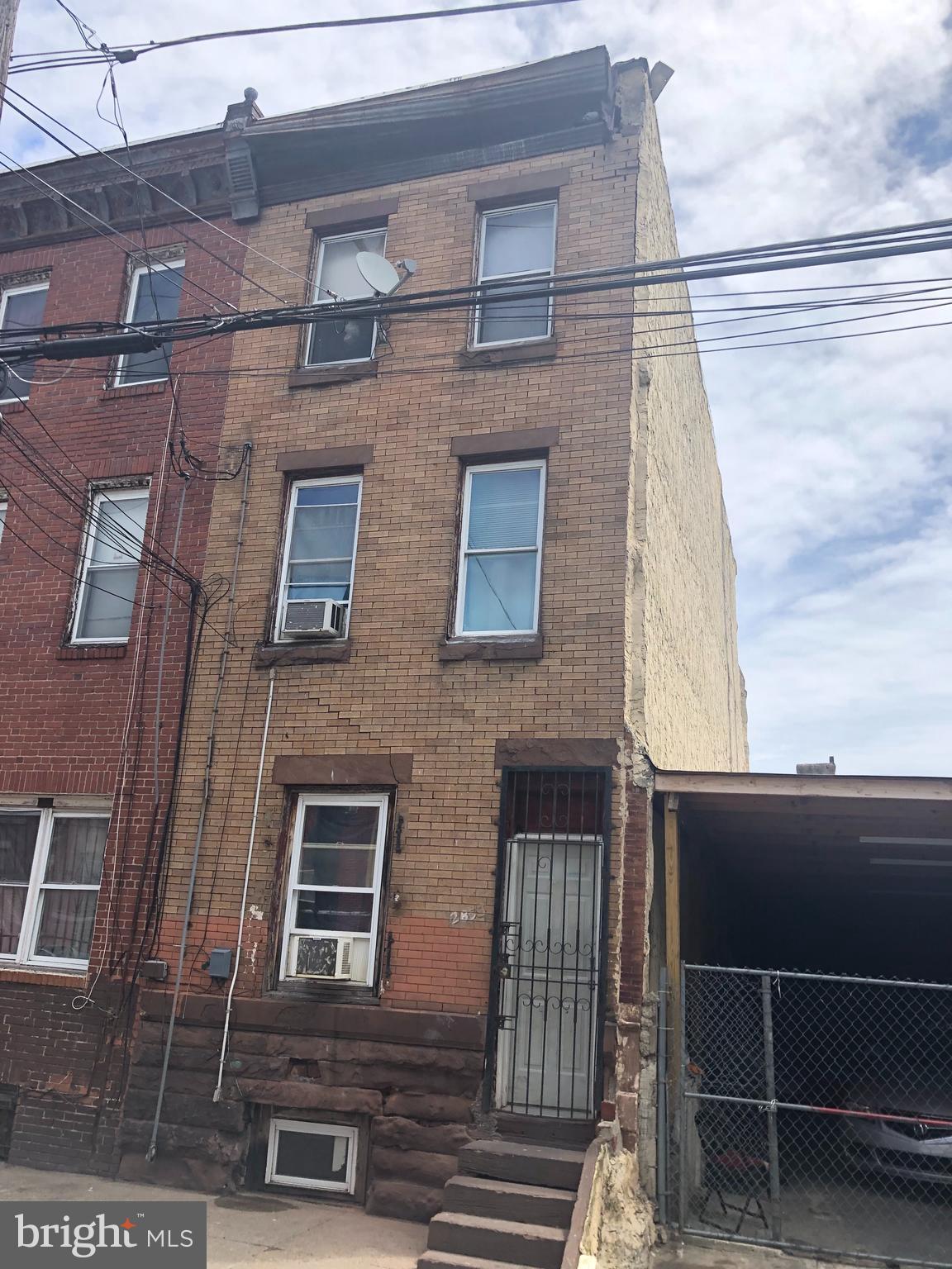 a front view of a building with glass windows