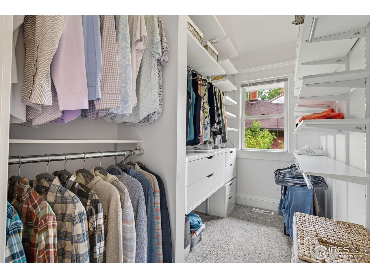 1719 Mapleton Avenue Boulder, CO 80304 - Photo 21 of 50 a view of walk in closet with clothes and shoes
