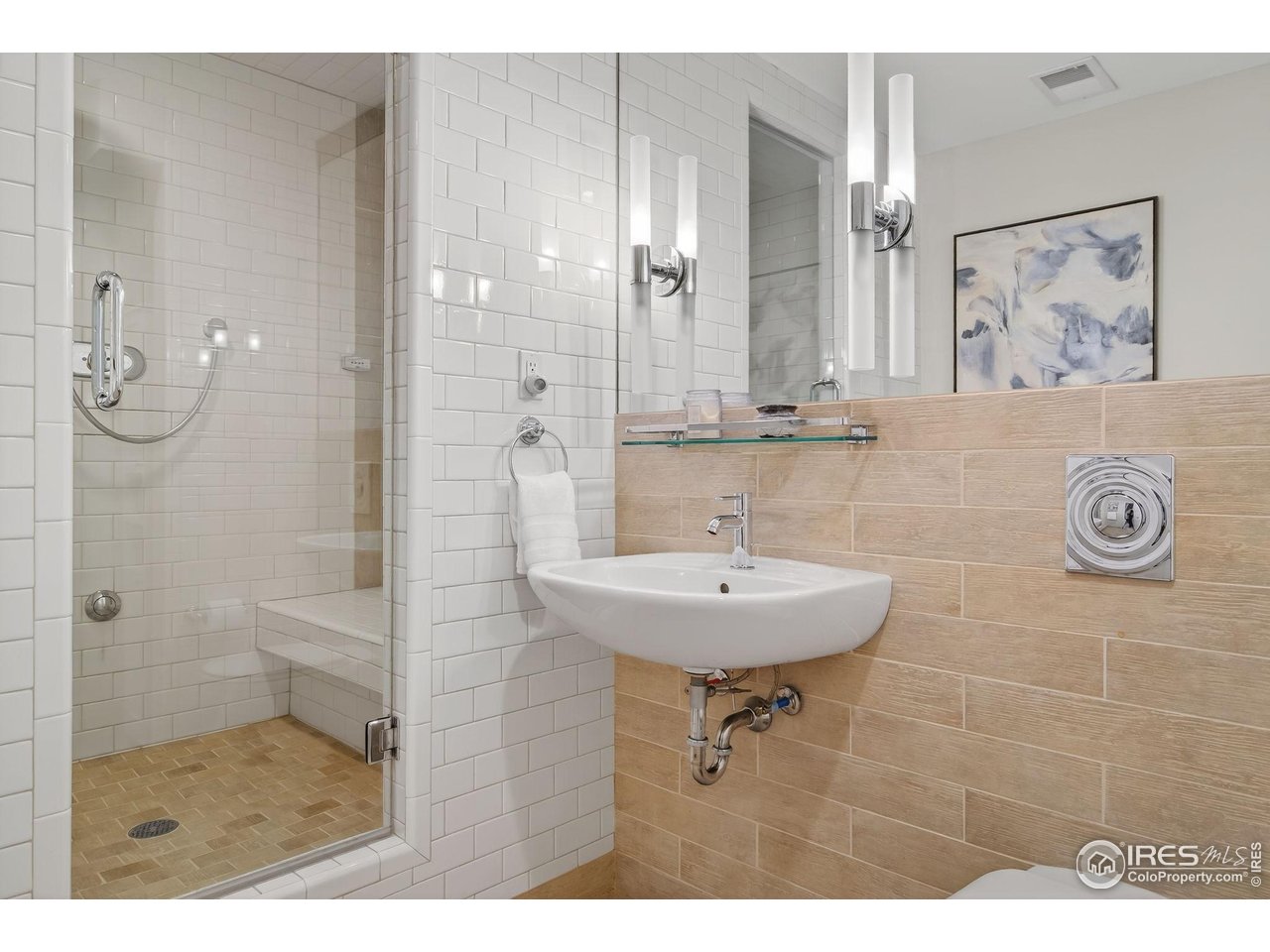 1719 Mapleton Avenue Boulder, CO 80304 - Photo 29 of 50 a bathroom with a sink a toilet and shower