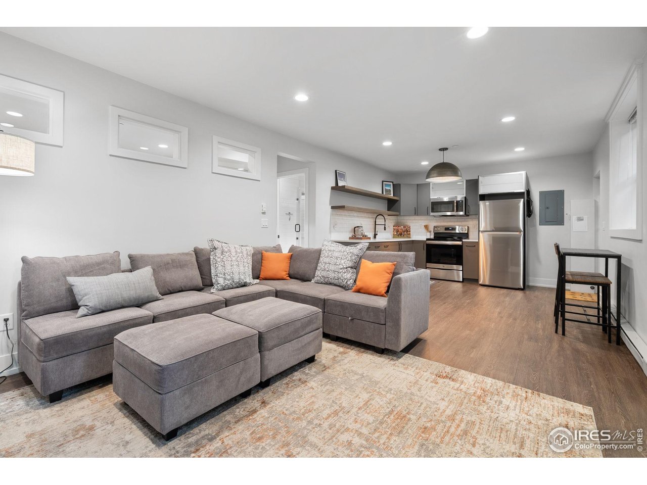 1719 Mapleton Avenue Boulder, CO 80304 - Photo 36 of 50 a living room with furniture and kitchen view