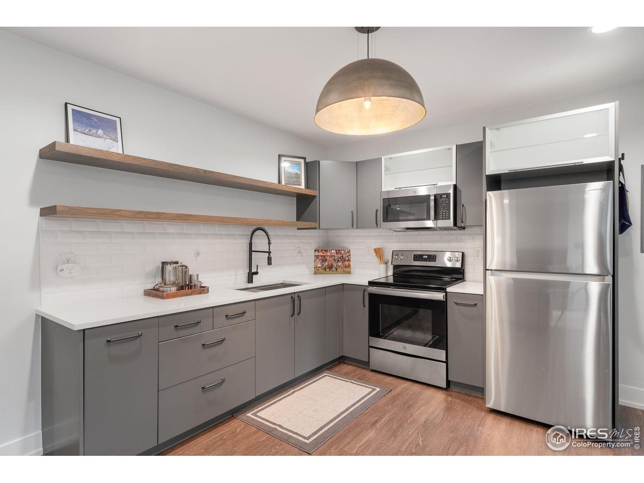 1719 Mapleton Avenue Boulder, CO 80304 - Photo 37 of 50 a kitchen with a sink stainless steel appliances and cabinets