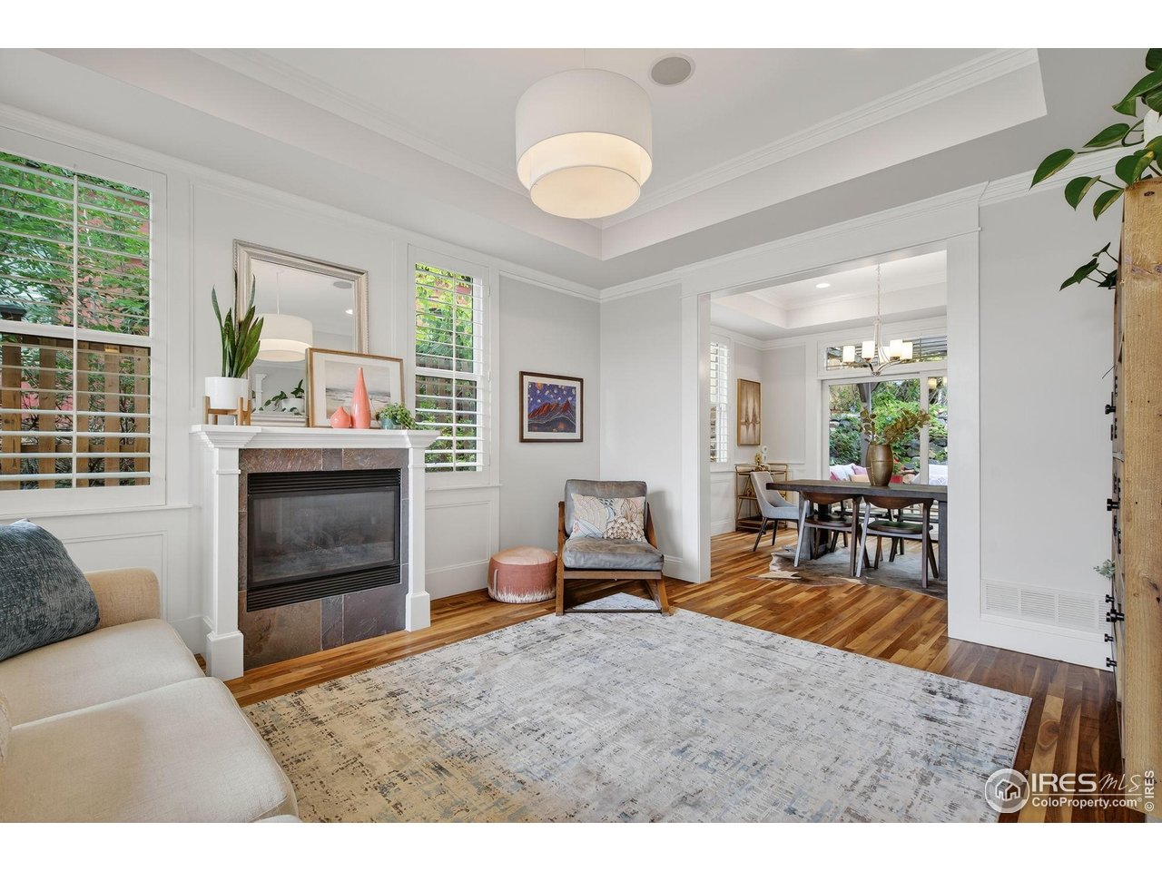 1719 Mapleton Avenue Boulder, CO 80304 - Photo 5 of 50 a living room with furniture and a window