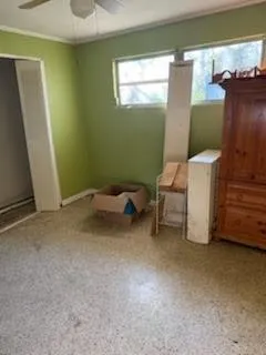 a room with furniture and a window