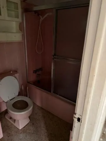 a bathroom with a sink and a toilet
