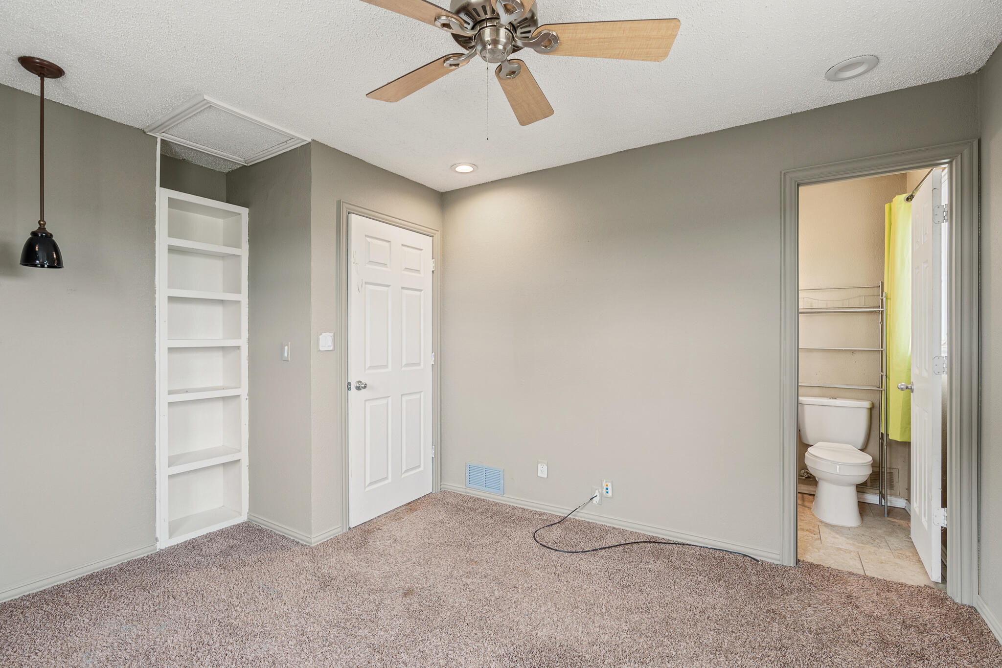 903 Highway 87 Kress, TX 79052 - Photo 17 of 26 a view of an empty room and a bathroom