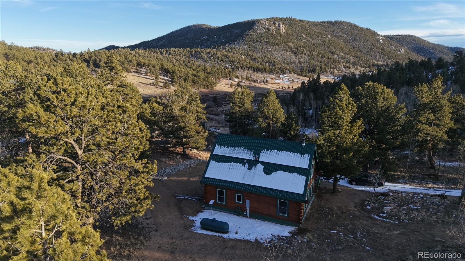116 Dakota Path Lake George, CO 80827 - Photo 36 of 38 a view of a house with a yard