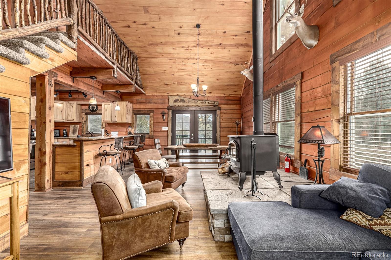 116 Dakota Path Lake George, CO 80827 - Photo 9 of 38 a outdoor living space with patio furniture and a fireplace