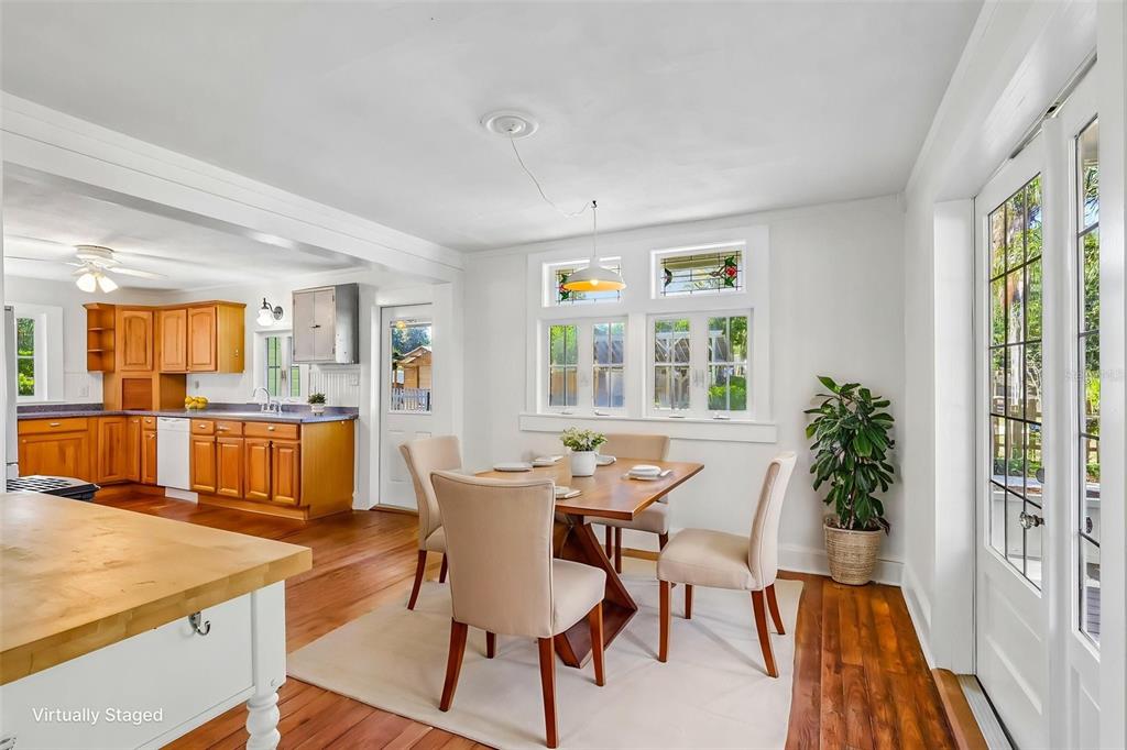 1190 Old Mt Dora Road Eustis, FL 32726 - Photo 25 of 69 a view of a dining room with furniture and a potted plant