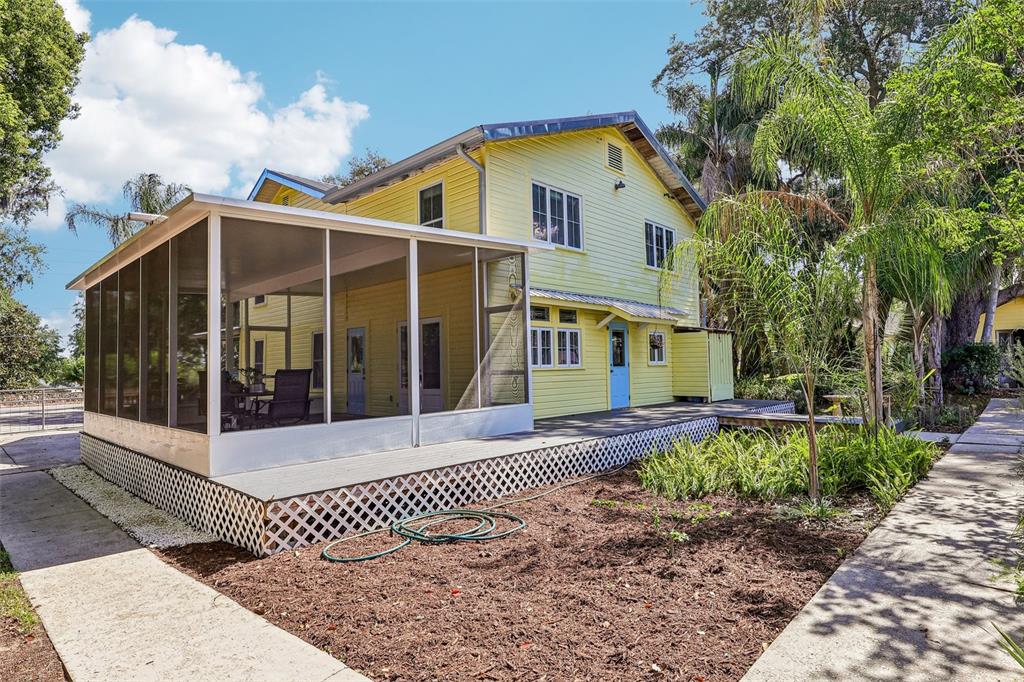1190 Old Mt Dora Road Eustis, FL 32726 - Photo 54 of 69 a front view of a house with a garden
