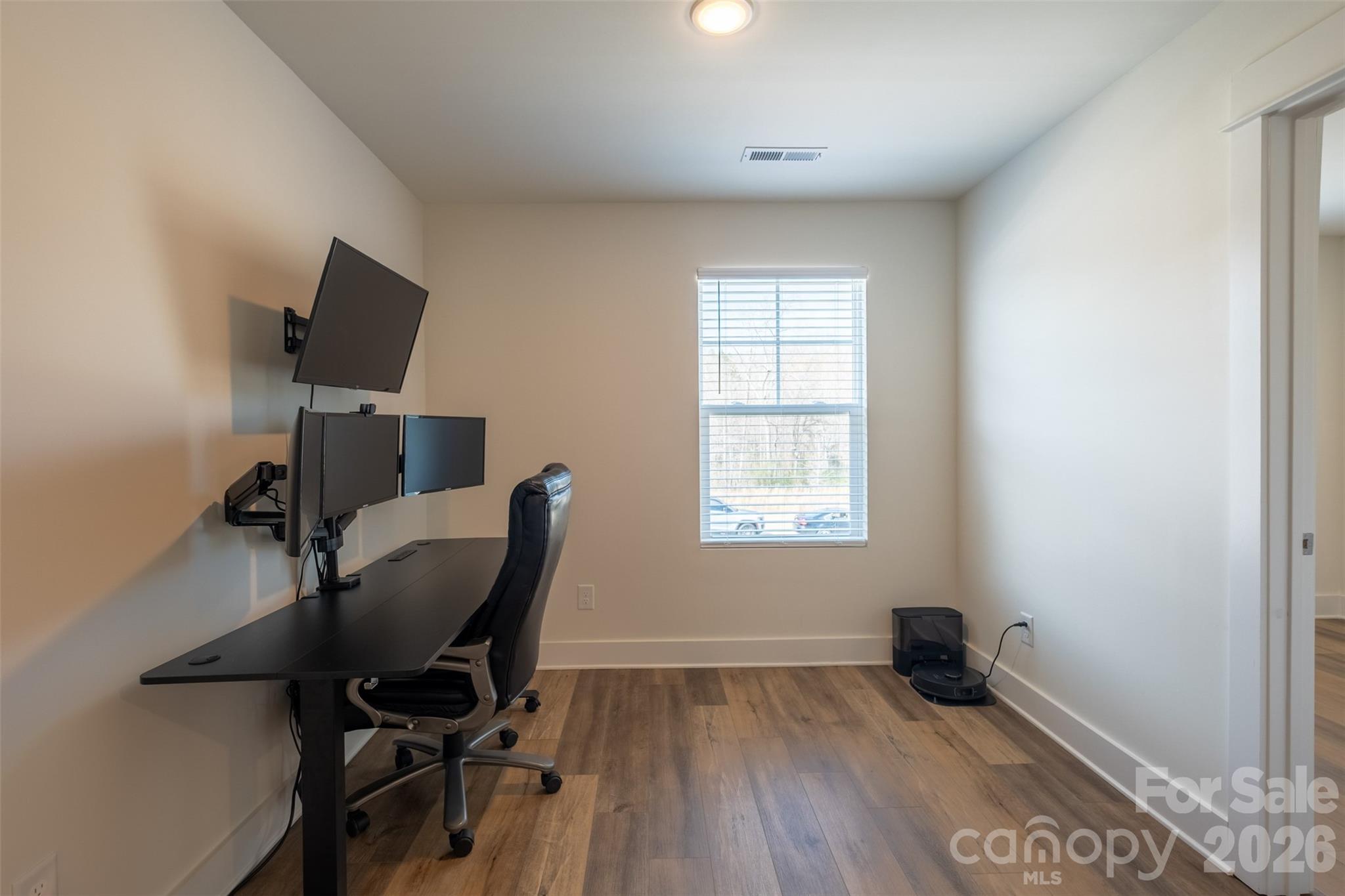 220 Sugar Hill Road Troutman, NC 28166 - Photo 19 of 37 a view of workspace with a window
