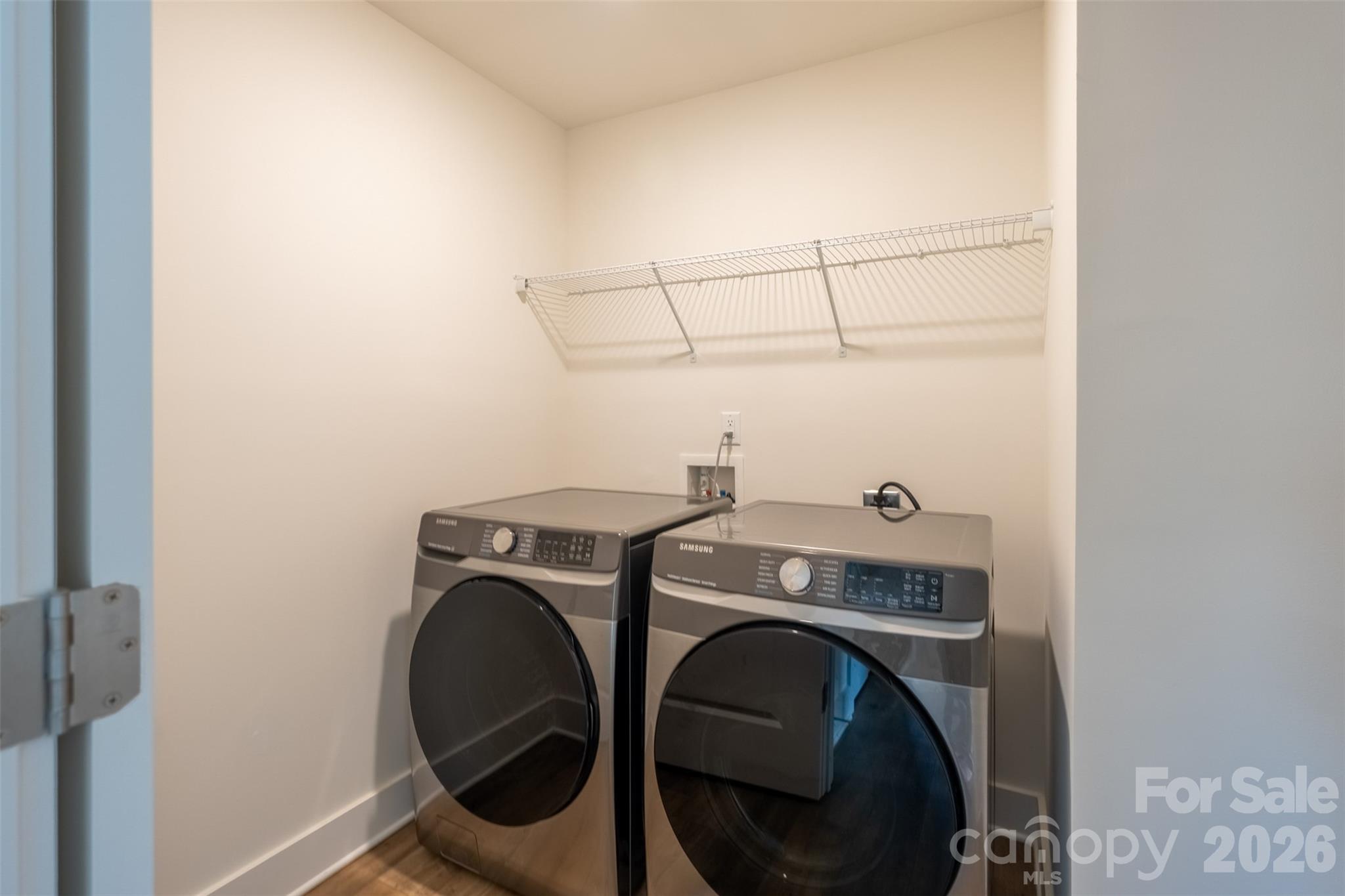 220 Sugar Hill Road Troutman, NC 28166 - Photo 28 of 37 a utility room with dryer and washer