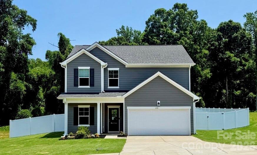220 Sugar Hill Road Troutman, NC 28166 - Photo 36 of 37 a view of house with yard and green space