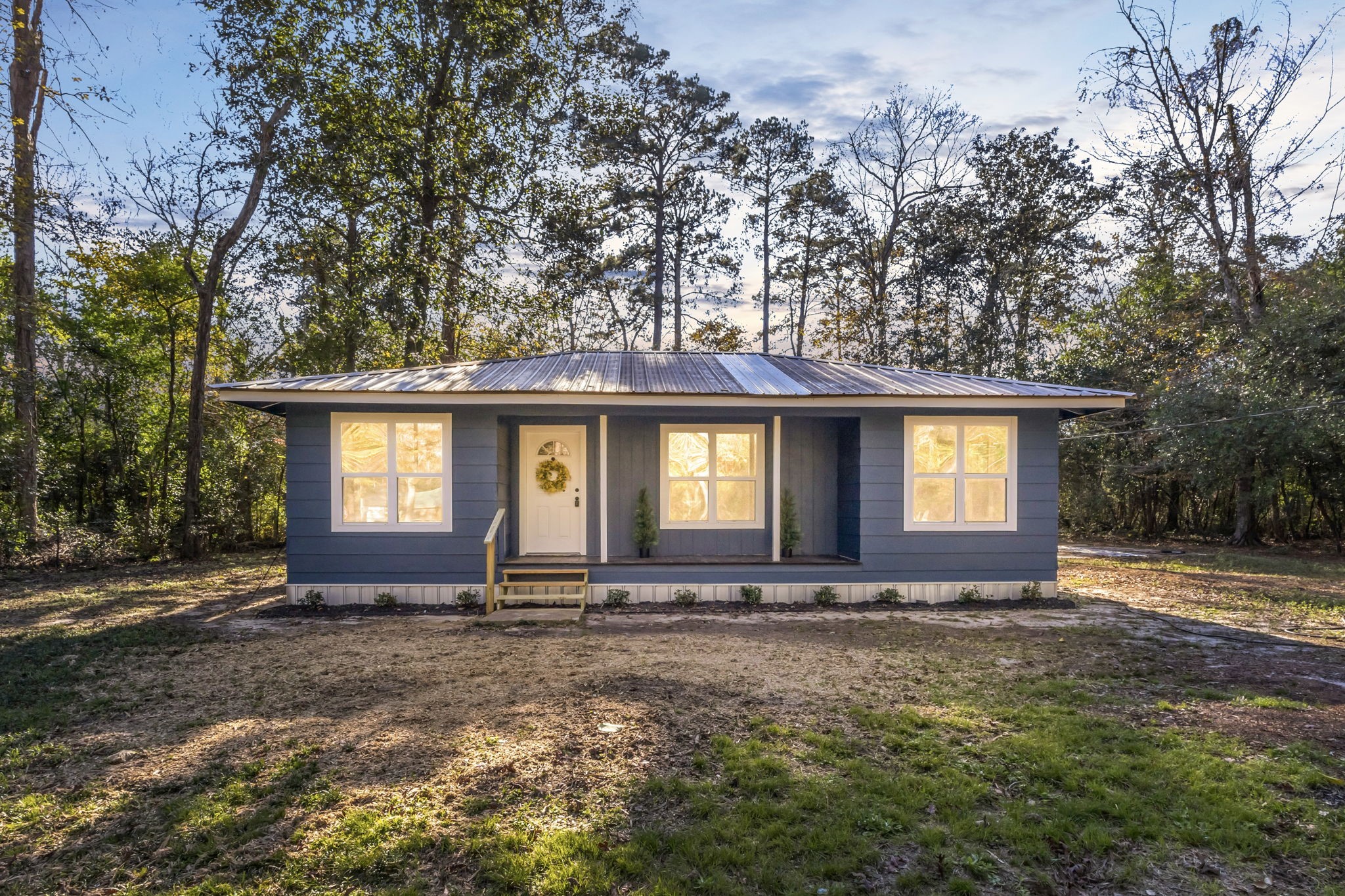 180 Friar Tuck Drive Ivanhoe, TX 75979 - Photo 1 of 31 a front view of a house with a yard