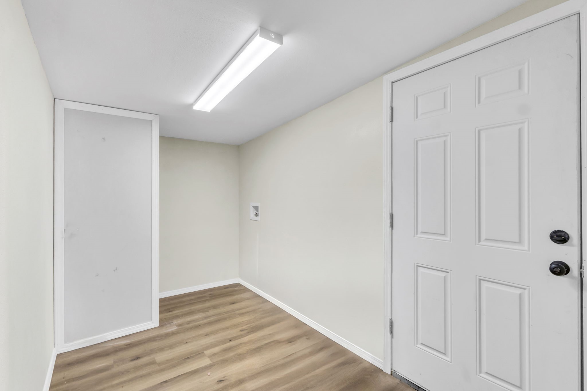 180 Friar Tuck Drive Ivanhoe, TX 75979 - Photo 28 of 31 wooden floor in an empty room