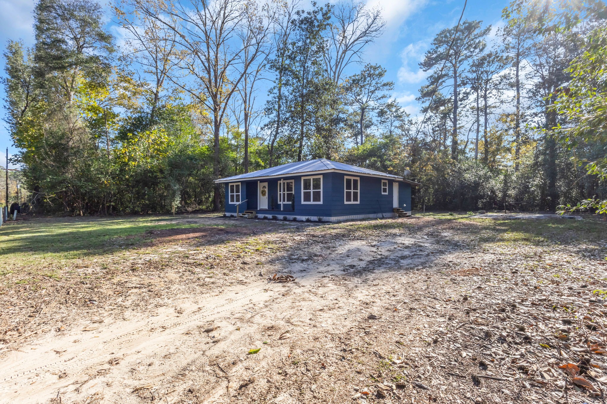 180 Friar Tuck Drive Ivanhoe, TX 75979 - Photo 7 of 31 a view of house with a yard