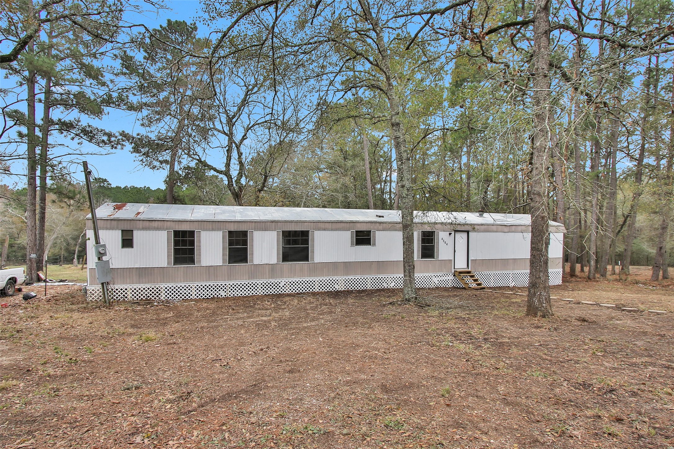 Split A Tall Pine Road Navasota, TX 77868 - Photo 12 of 22 a house with a tree in front of it