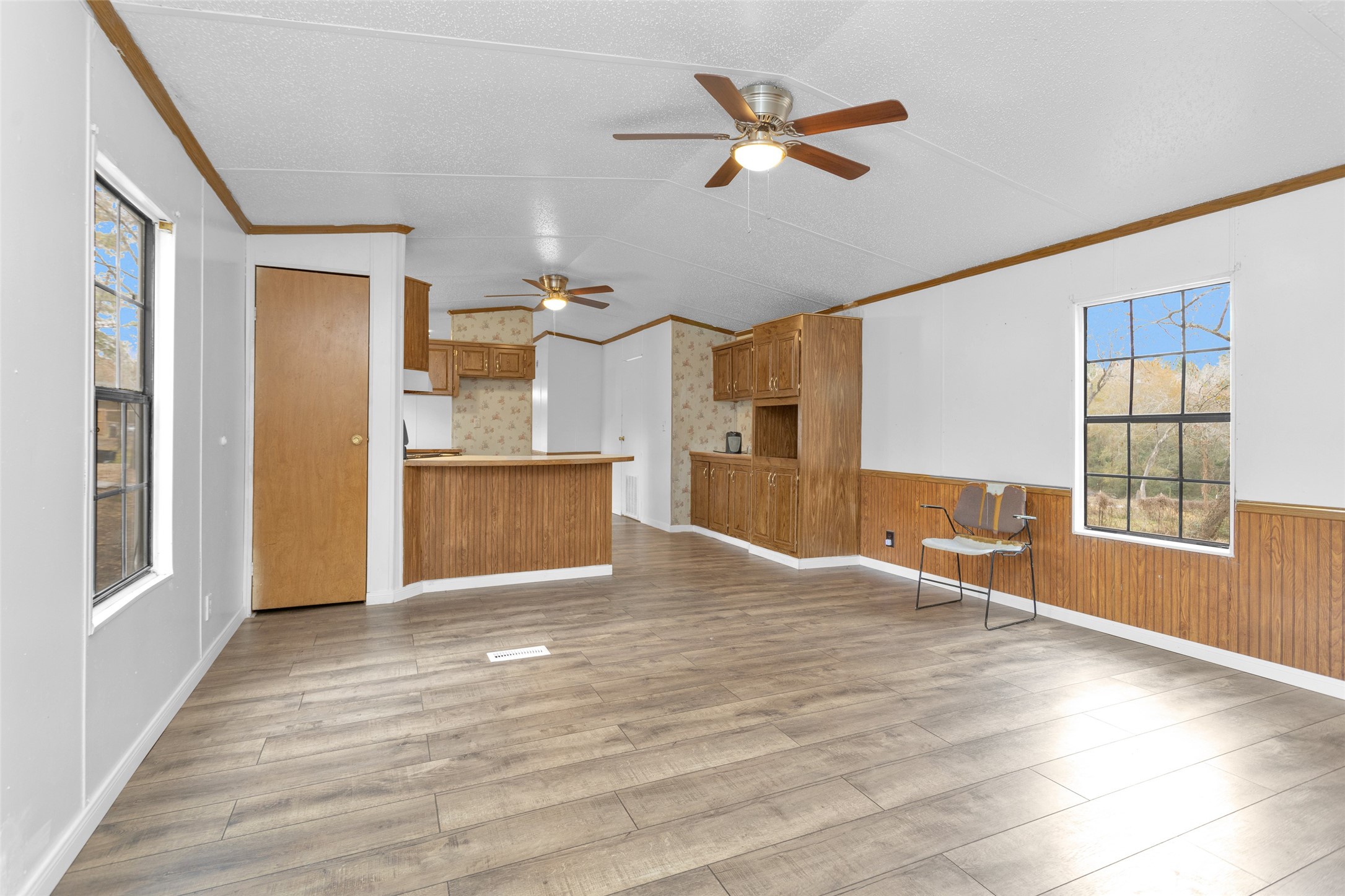 Split A Tall Pine Road Navasota, TX 77868 - Photo 20 of 22 a view of a livingroom with a ceiling fan and window