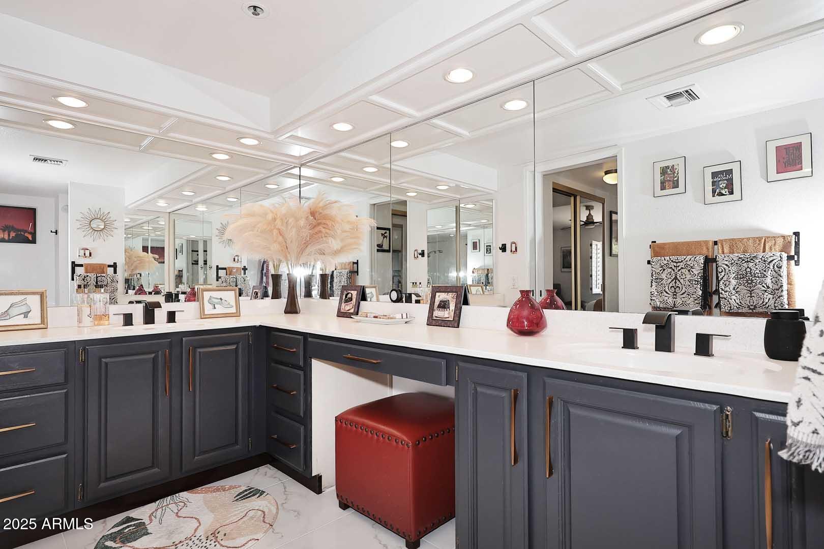 7860 East Camelback Road, Unit 404 Scottsdale, AZ 85251 - Photo 19 of 33 a kitchen with a sink cabinets and wooden floor