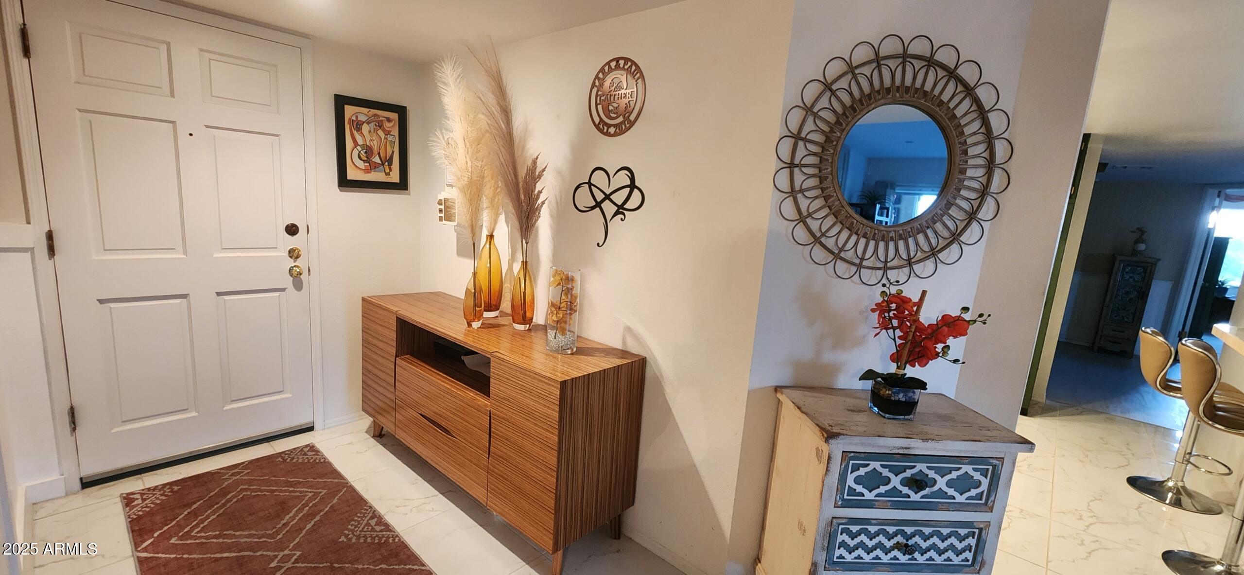 7860 East Camelback Road, Unit 404 Scottsdale, AZ 85251 - Photo 2 of 33 a view of entryway and workspace