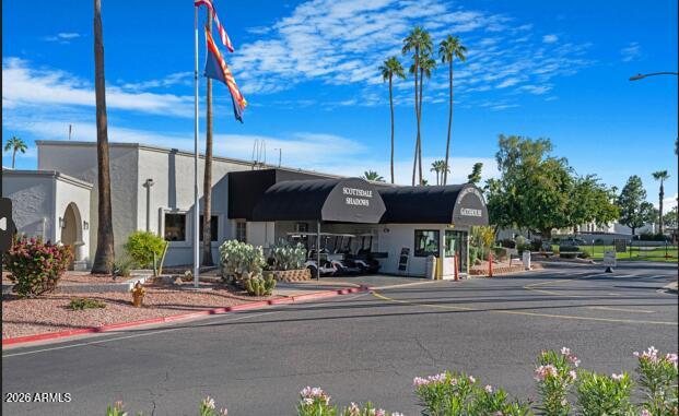 7860 East Camelback Road, Unit 404 Scottsdale, AZ 85251 - Photo 30 of 33 a front view of a building with street view
