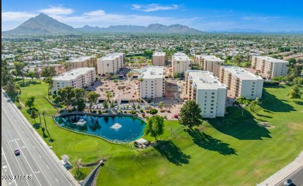 7860 East Camelback Road, Unit 404 Scottsdale, AZ 85251 - Photo 31 of 33 a view of a city with lake view