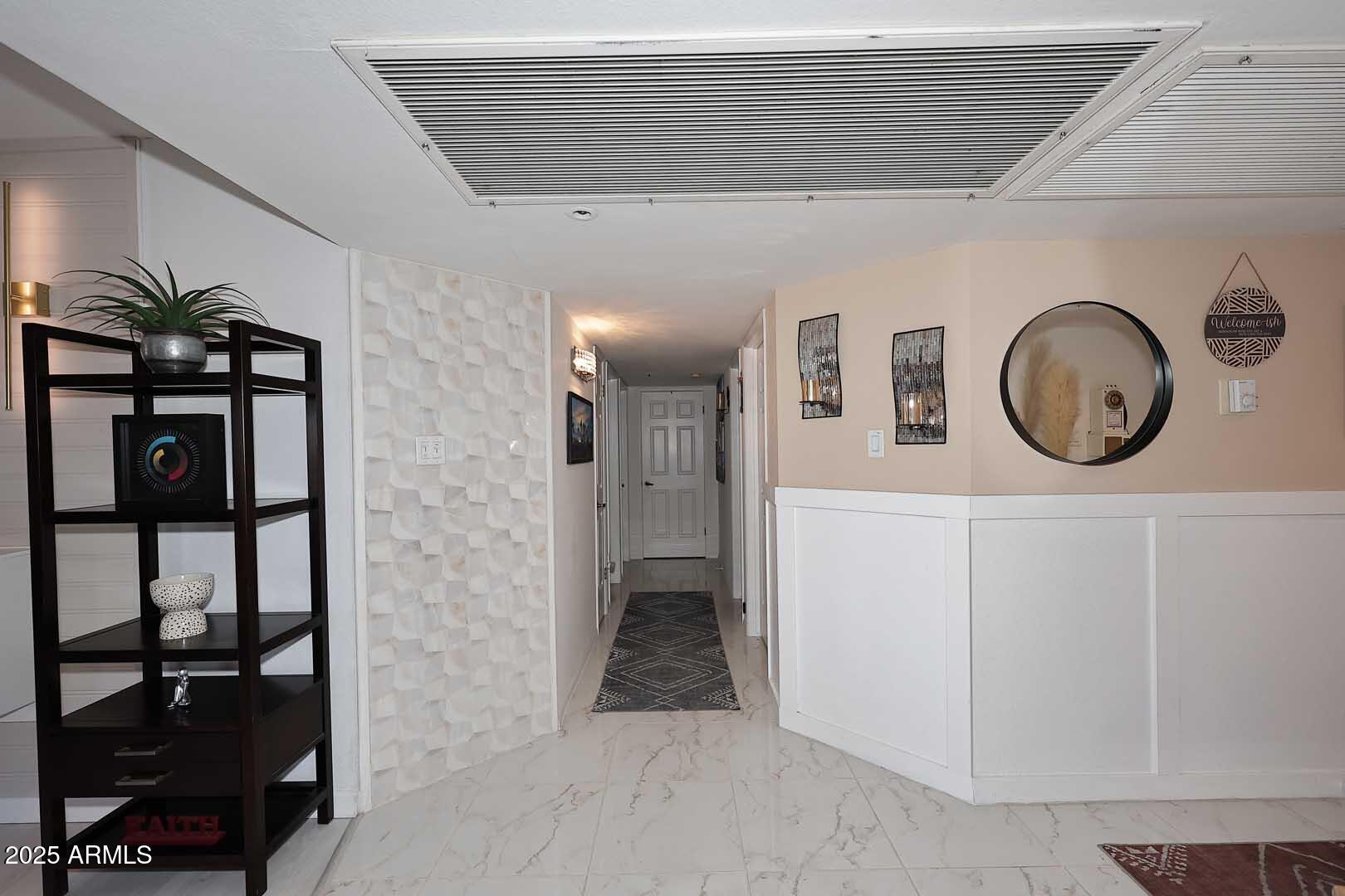 7860 East Camelback Road, Unit 404 Scottsdale, AZ 85251 - Photo 4 of 33 a view of a hallway with elevator