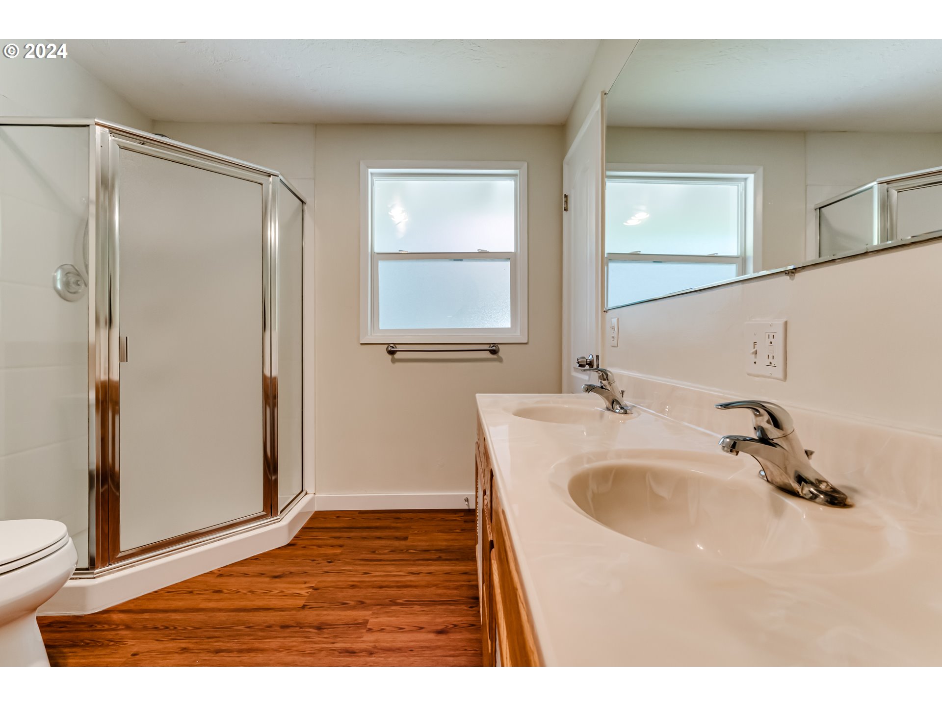 2280 City View Street Eugene, OR 97405 - Photo 20 of 30 a bathroom with a sink and a mirror