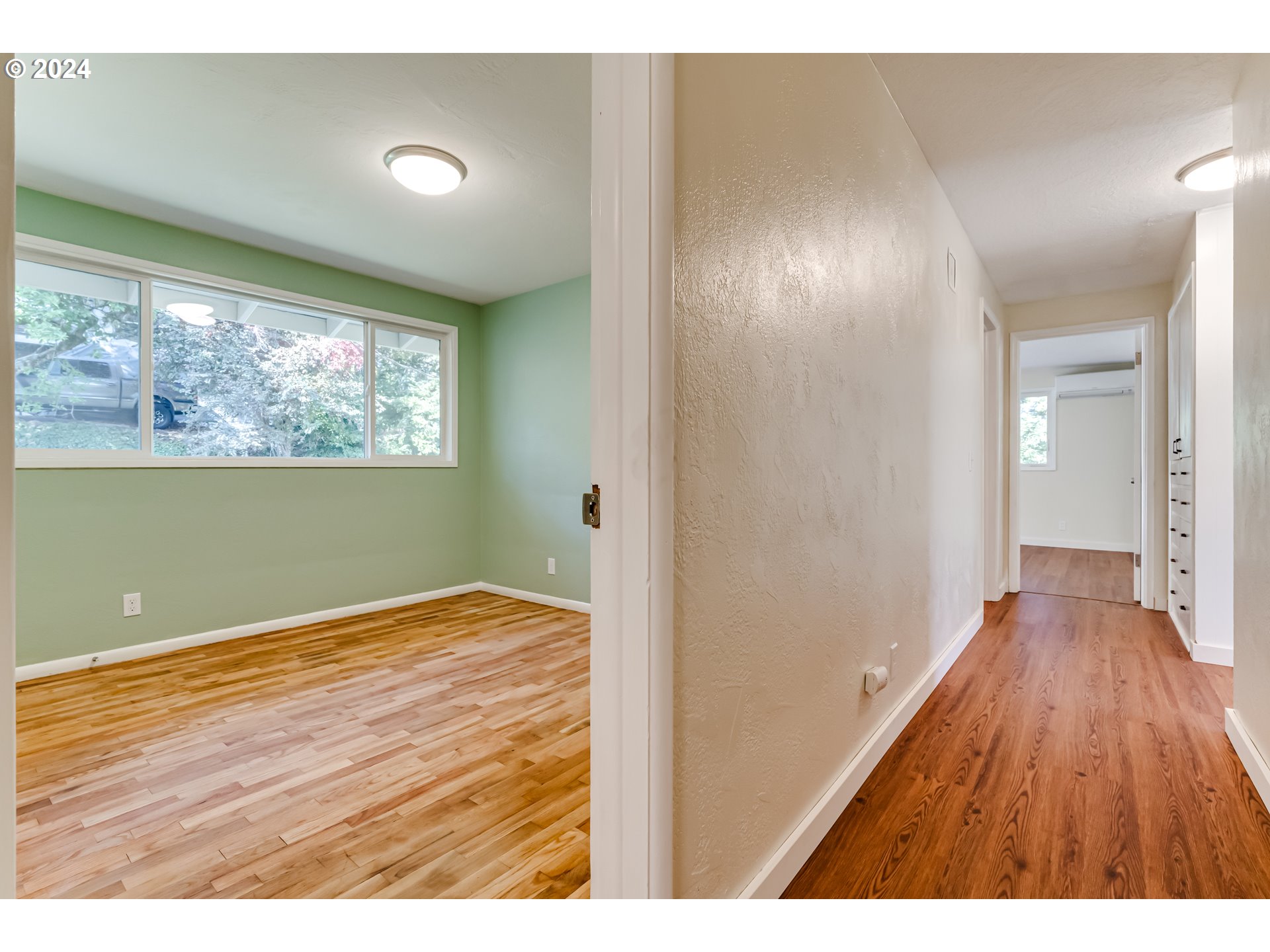 2280 City View Street Eugene, OR 97405 - Photo 23 of 30 a view of empty room with wooden floor