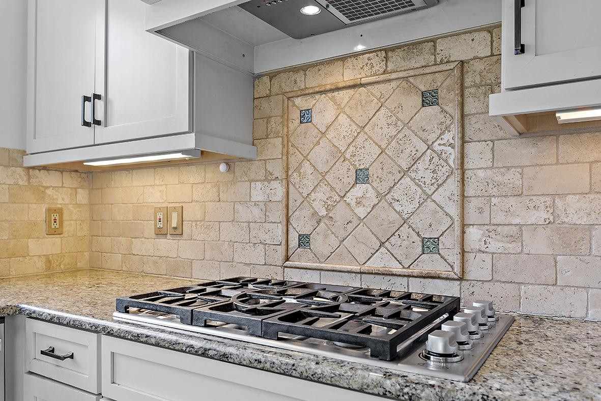 8120 Hawkshead Road Wake Forest, NC 27587 - Photo 28 of 70 a white stove top oven sitting inside of a kitchen