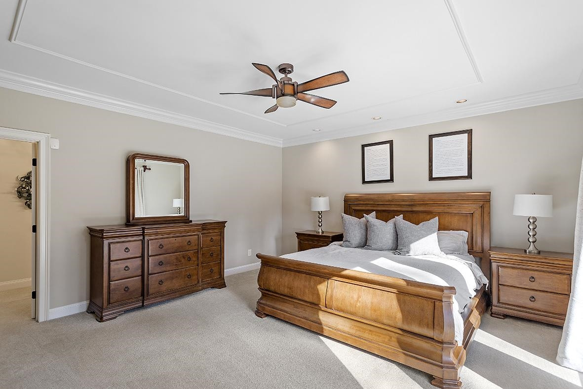 8120 Hawkshead Road Wake Forest, NC 27587 - Photo 29 of 70 a bed room with a bed and a dresser
