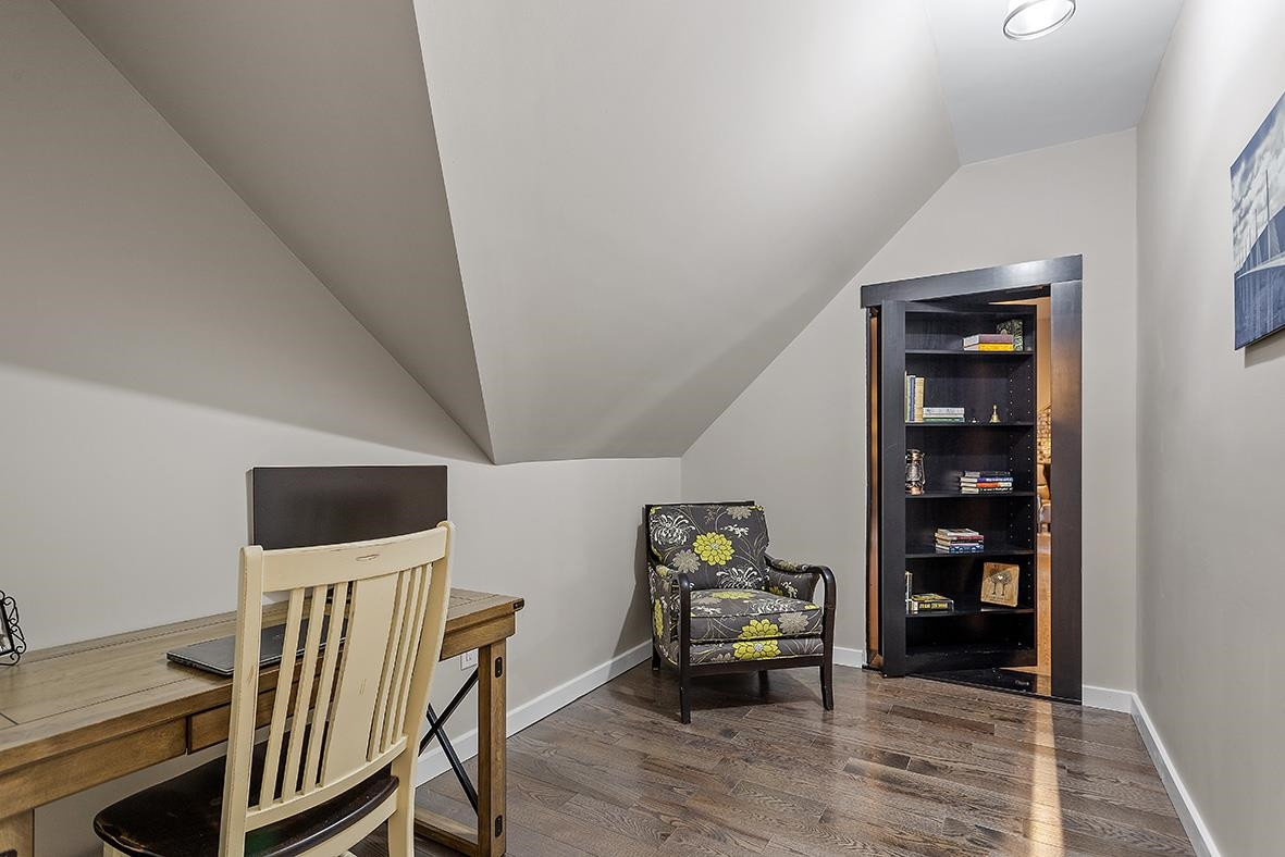 8120 Hawkshead Road Wake Forest, NC 27587 - Photo 47 of 70 a living room with furniture and wooden floor
