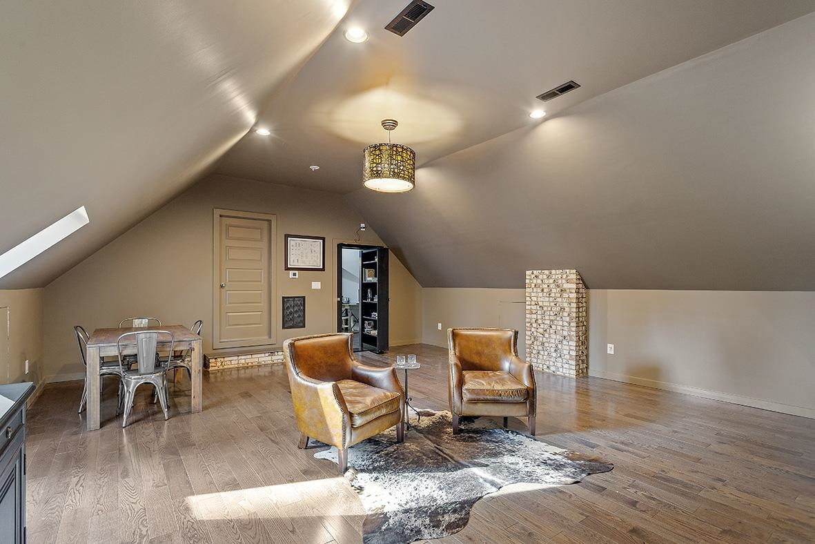 8120 Hawkshead Road Wake Forest, NC 27587 - Photo 49 of 70 a living room with furniture and a wooden floor
