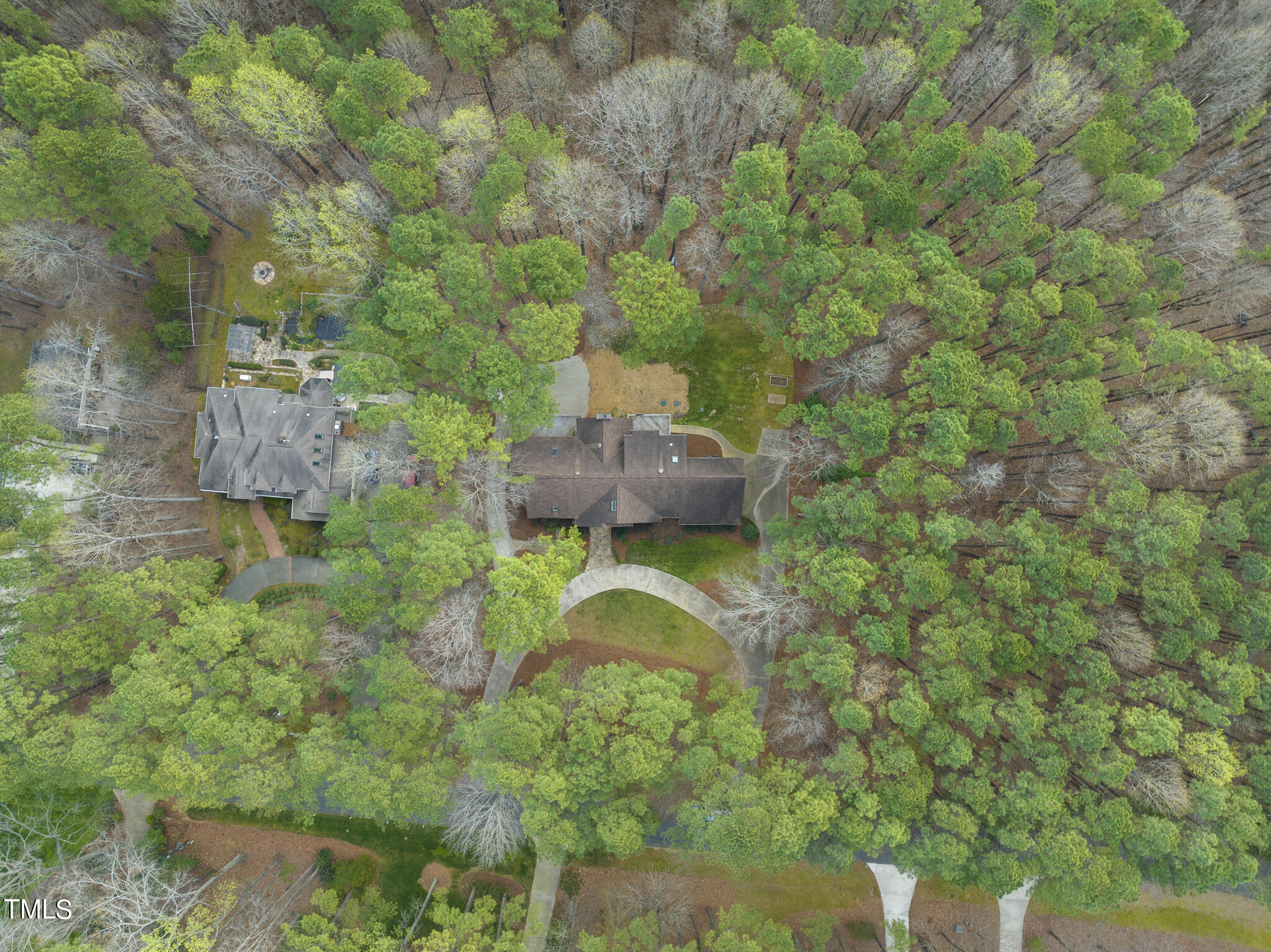 8120 Hawkshead Road Wake Forest, NC 27587 - Photo 58 of 70 a backyard of a house with a garden and plants