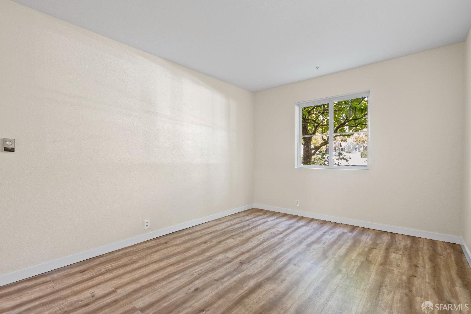1862 Ellis Street, Unit B San Francisco, CA 94115 - Photo 33 of 41 an empty room with a window