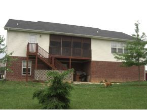 214 Rockingham Road Johnson City, TN 37615 - Photo 2 of 12 rear screened porch and patio
