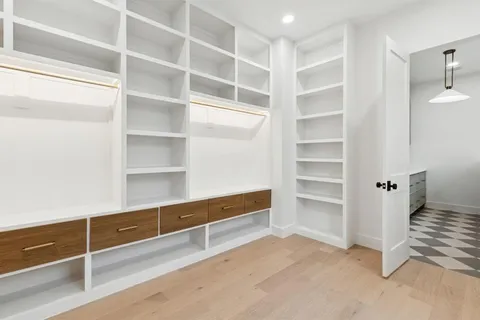 a view of an empty walk in closet