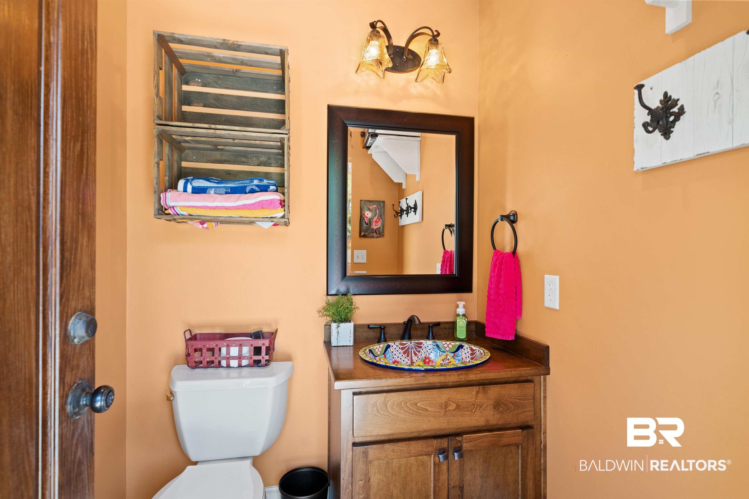 47252 Emmons Road Bay Minette, AL 36507 - Photo 43 of 50 Bathroom featuring vanity and toilet