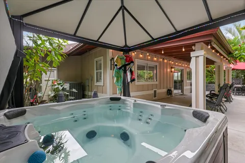 a view of an outdoor sitting area with furniture