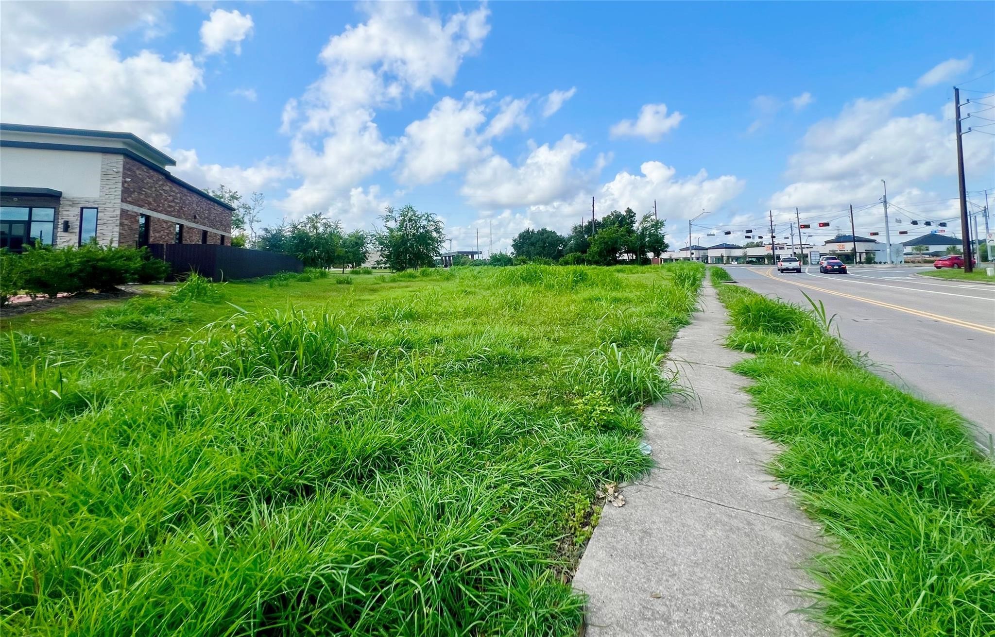 a view of a street both side of a building