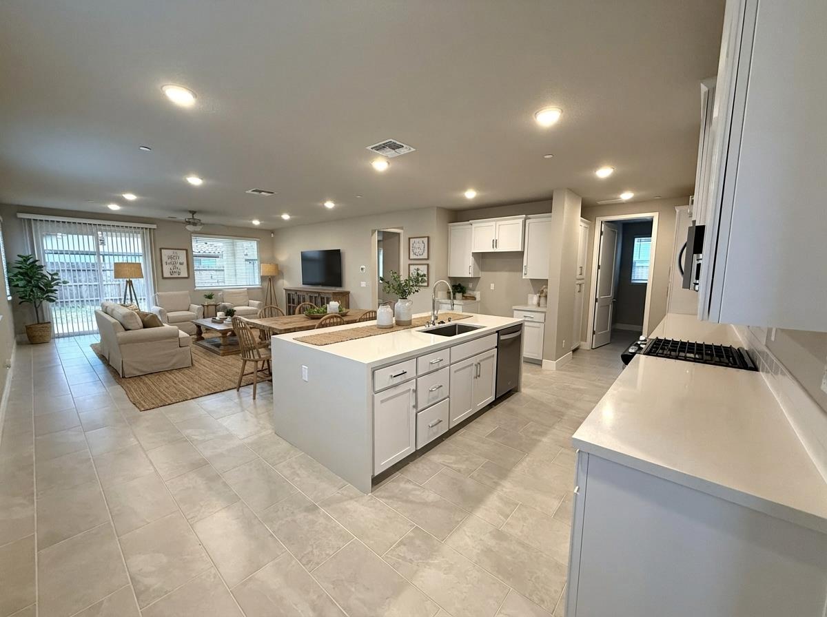 3054 Banano Way Rancho Cordova, CA 95742 - Photo 3 of 5 a large white kitchen with lots of counter space