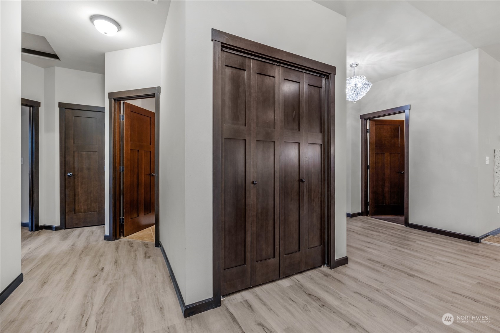 7521 Broadway Everett, WA 98203 - Photo 12 of 25 an empty room with wooden floor & closet area