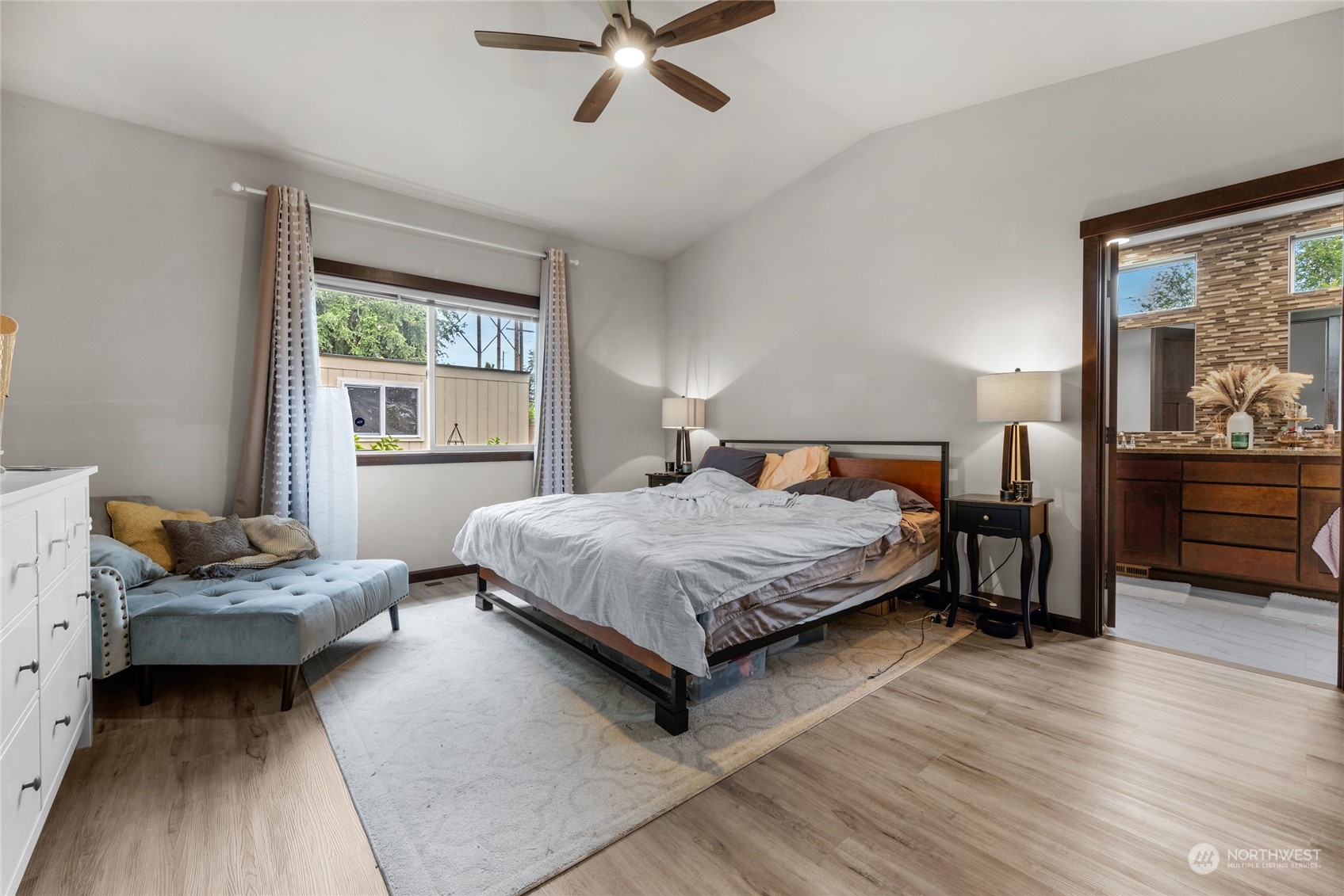 7521 Broadway Everett, WA 98203 - Photo 14 of 25 a bedroom with a bed and a window